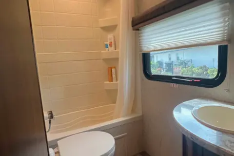 Chase's Heartland Caliber North Trail 24 BHS Travel Trailer