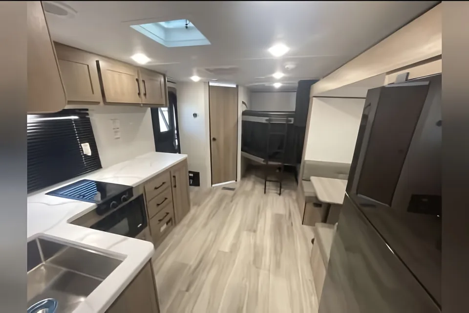 The Traveler Keystone Coleman 22BX Light Travel Trailer