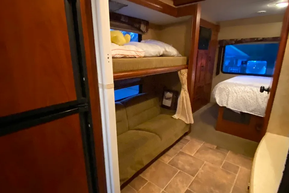 Bunk Up in this Class C that sleeps 8 -pkus ask about our other models!