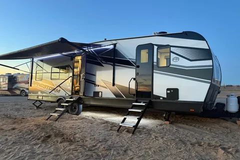 Aracely’s Forest River Sandstorm Toy Hauler