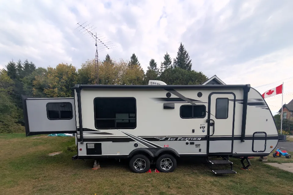 Steve's Jayco Feather light x213 Travel Trailer