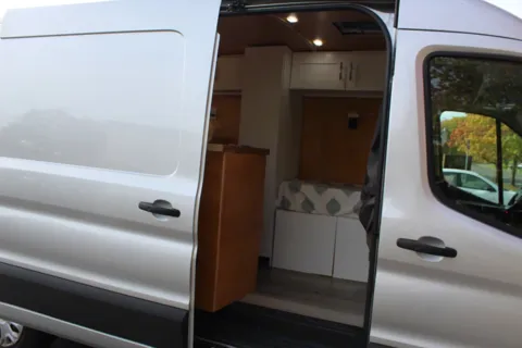 All-Electric 2023 Ford Camper van with Wifi, Office & Comforts!
