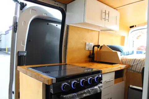 All-Electric 2023 Ford Camper van with Wifi, Office & Comforts!