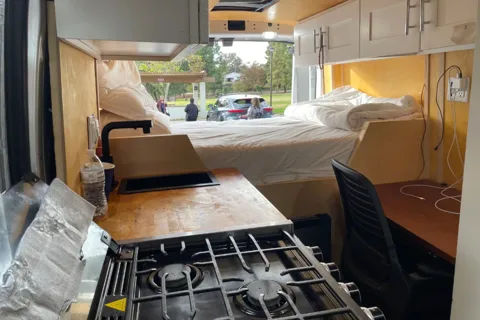 All-Electric 2023 Ford Camper van with Wifi, Office & Comforts!