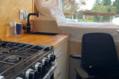 All-Electric 2023 Ford Camper van with Wifi, Office & Comforts!