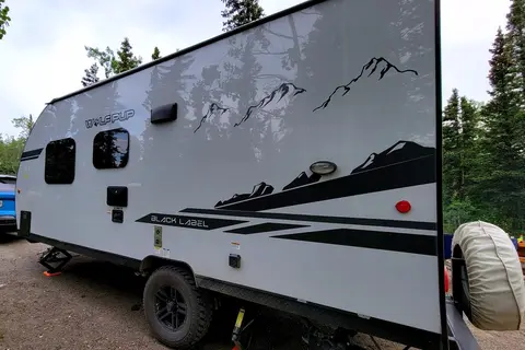 Leigh and Kenzie's Forest River Cherokee Wolf Pup 16FQBL Travel Trailer