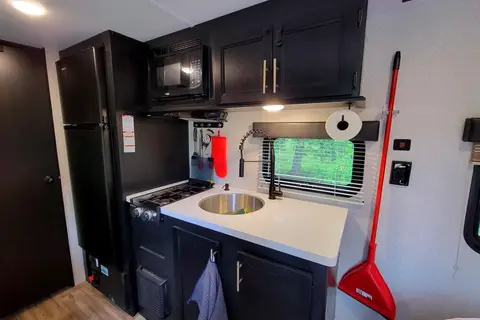 Leigh and Kenzie's Forest River Cherokee Wolf Pup 16FQBL Travel Trailer