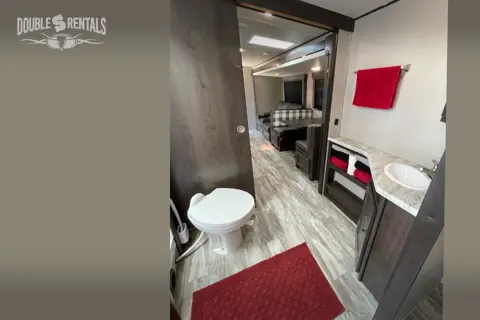 TRANSCEND BH w/ QUAD BUNKS, 1.5 BATHS, THEATER SEATING & DINETTE