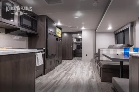 TRANSCEND BH w/ QUAD BUNKS, 1.5 BATHS, THEATER SEATING & DINETTE