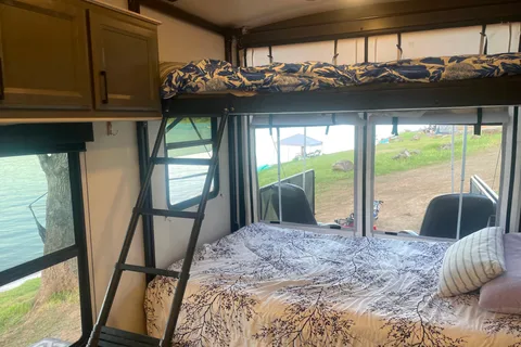 2021 30ft. Toy hauler with free kayaks and paddle boards