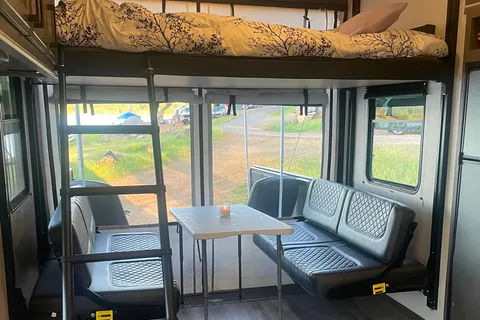 2021 30ft. Toy hauler with free kayaks and paddle boards