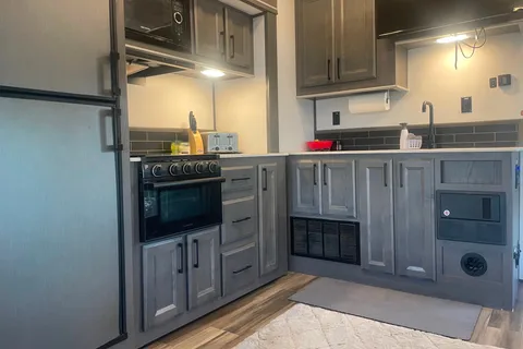 2021 30ft. Toy hauler with free kayaks and paddle boards