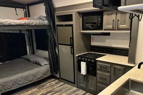 2021 30ft. Toy hauler with free kayaks and paddle boards