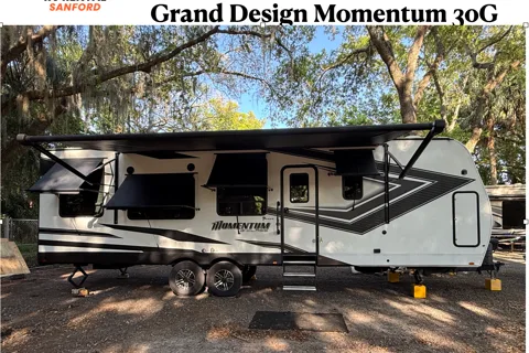Moira's Mansion 2022 Grand Design Momentum Toy Hauler