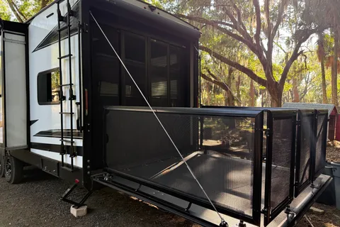 Moira's Mansion 2022 Grand Design Momentum Toy Hauler