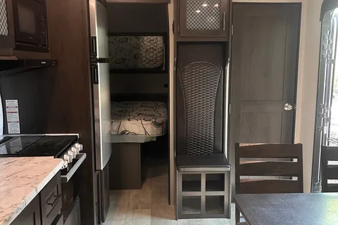 Moira's Mansion 2022 Grand Design Momentum Toy Hauler