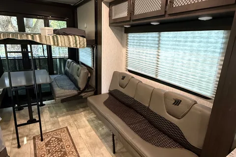 Moira's Mansion 2022 Grand Design Momentum Toy Hauler