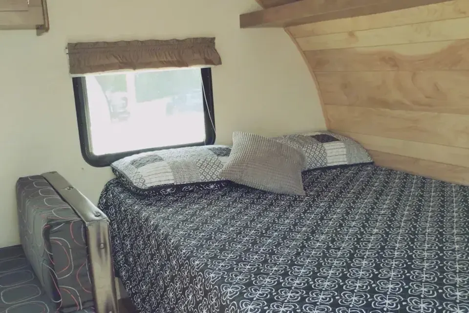 Meet Judy, our lightweight, retro themed little camper with bunkbeds to sleep five!