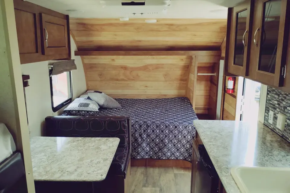 Meet Judy, our lightweight, retro themed little camper with bunkbeds to sleep five!