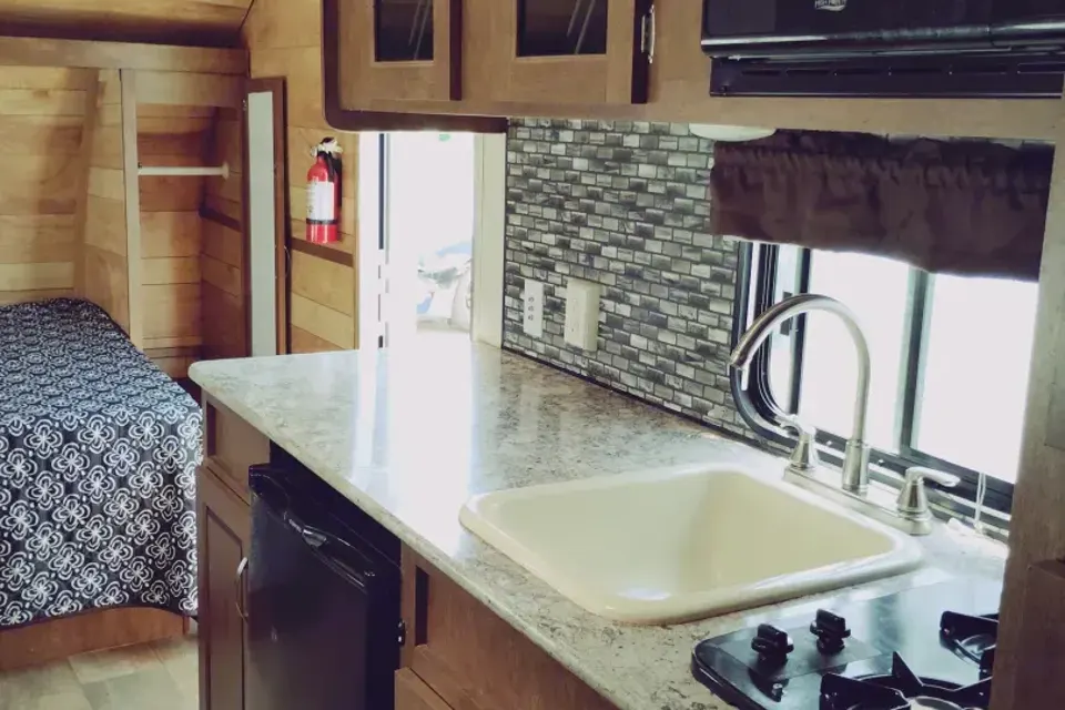 Meet Judy, our lightweight, retro themed little camper with bunkbeds to sleep five!