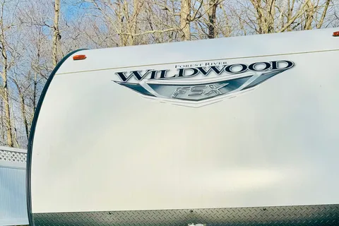Pettie Family-Size Forest River Wildwood FSX 179DBK Travel Trailer