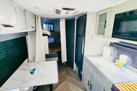 Pettie Family-Size Forest River Wildwood FSX 179DBK Travel Trailer
