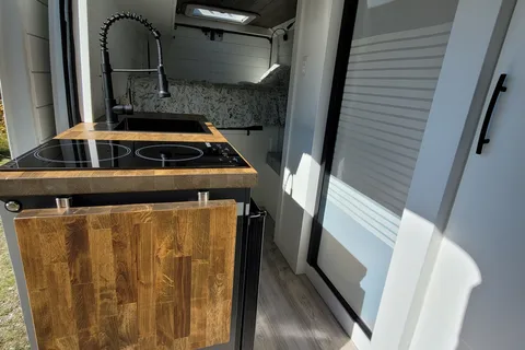 Cozy custom crafted van with Shower, Toilet, A/C , Heat, Solar and more