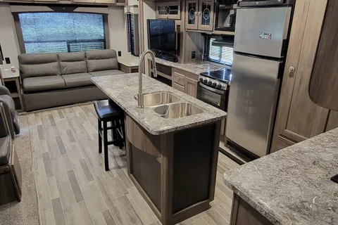 Dream RV, large rear living with TV.