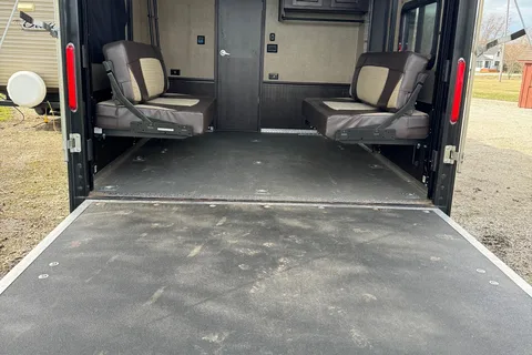 Spacious Toy Hauler Trailer: Queen Beds, Massage Sofa, A/C & More!