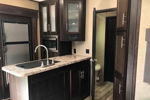 Spacious Toy Hauler Trailer: Queen Beds, Massage Sofa, A/C & More!