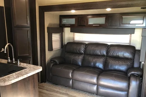 Spacious Toy Hauler Trailer: Queen Beds, Massage Sofa, A/C & More!