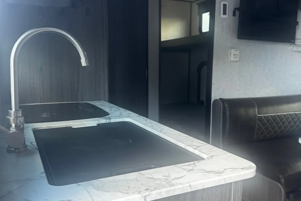 the Neville's Keystone Kodiak Club/175BH Travel Trailer