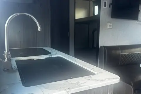 the Neville's Keystone Kodiak Club/175BH Travel Trailer