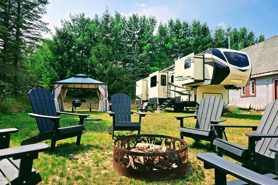 Treelined RV Stay Near Boyne — Fire Pit, S'mores, Dogs Welcome