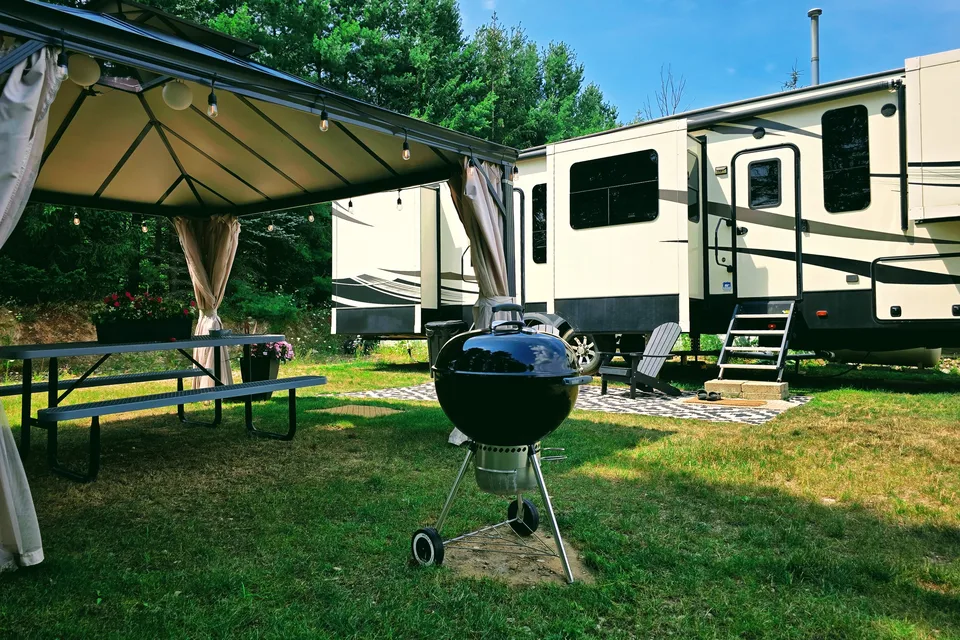 Treelined RV Stay Near Boyne — Fire Pit, S'mores, Dogs Welcome