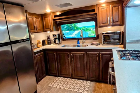 Treelined RV Stay Near Boyne — Fire Pit, S'mores, Dogs Welcome