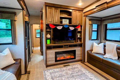 Treelined RV Stay Near Boyne — Fire Pit, S'mores, Dogs Welcome