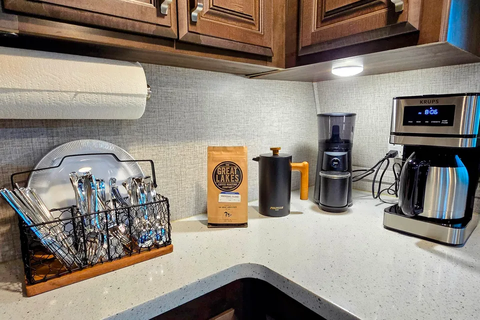 Treelined RV Stay Near Boyne — Fire Pit, S'mores, Dogs Welcome