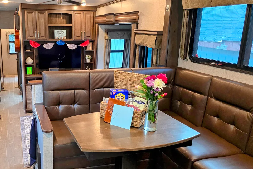 Treelined RV Stay Near Boyne — Fire Pit, S'mores, Dogs Welcome