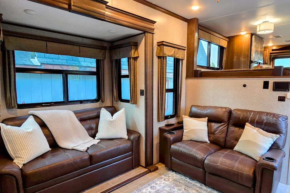 Treelined RV Stay Near Boyne — Fire Pit, S'mores, Dogs Welcome