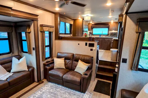 Treelined RV Stay Near Boyne — Fire Pit, S'mores, Dogs Welcome