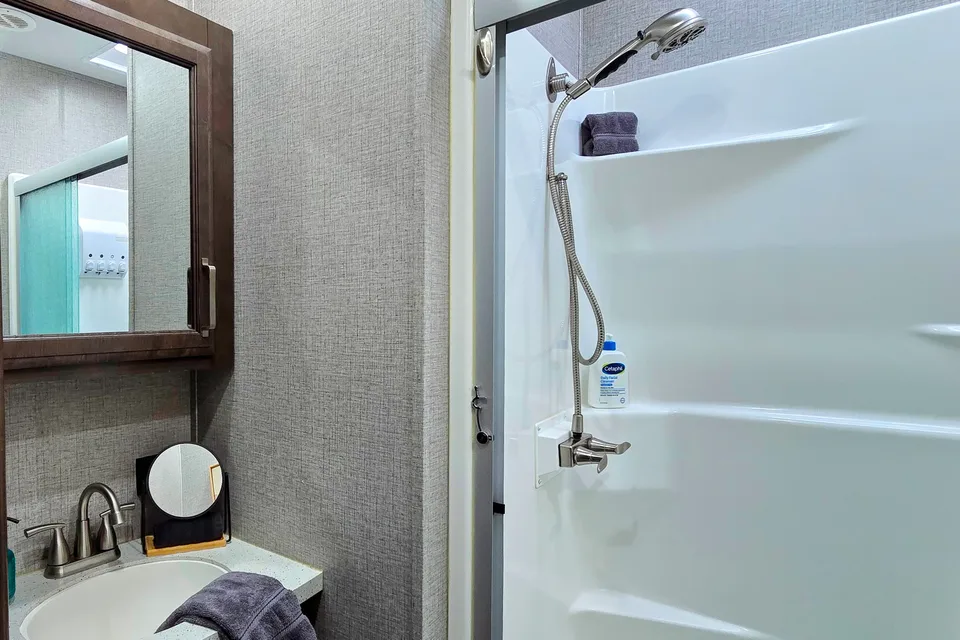 Treelined RV Stay Near Boyne — Fire Pit, S'mores, Dogs Welcome