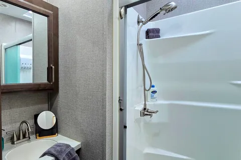 Treelined RV Stay Near Boyne — Fire Pit, S'mores, Dogs Welcome