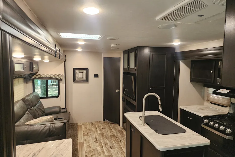 Ray Rays Travel Trailer with outdoor kitchen and bunk room