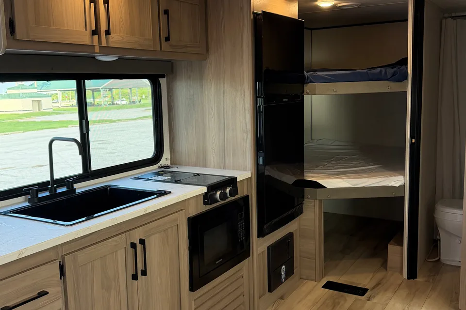 Bunkhouse Adventure  Keystone Coleman Light Travel Trailer