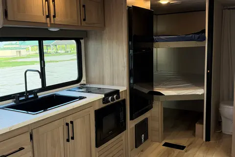 Bunkhouse Adventure  Keystone Coleman Light Travel Trailer