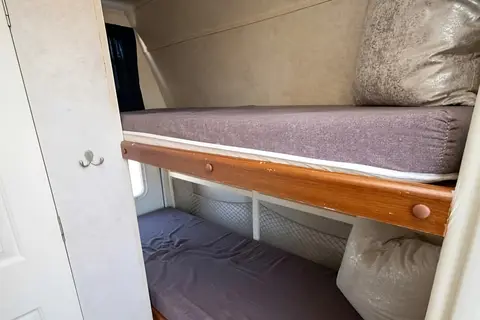 Cute, fully stocked Keystone Outback with rear slide sleeps 6