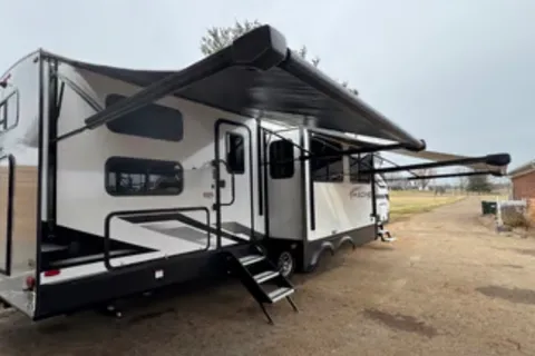 Forever Young 2025 Grand Design Imagine 3210BH Travel Trailer
