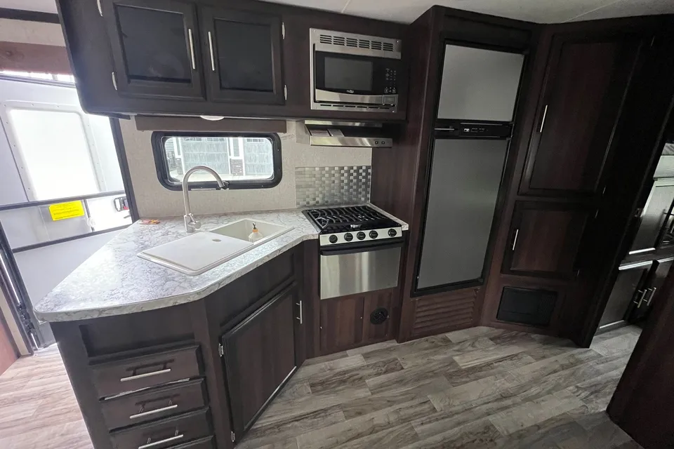 All you need to do is show up! FULLY STOCKED, FAMILY FRIENDLY like new 31’ with 2 slides Jayco WhiteHawk trailer!