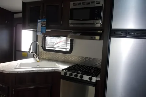 All you need to do is show up! FULLY STOCKED, FAMILY FRIENDLY like new 31’ with 2 slides Jayco WhiteHawk trailer!